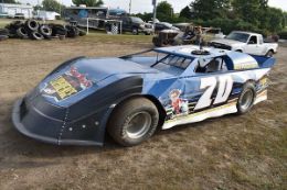 Driving a race car on dirt track at Albany, New York